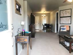 Entry view showing open living and dining areas.